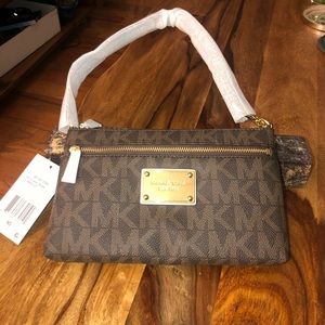 Brand new/with tags MK mini purse. Never used!